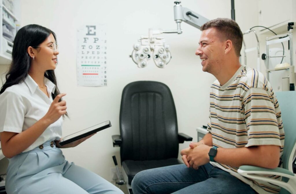 A person in their appointment with an optometrist after experiencing dry eye discomfort.
