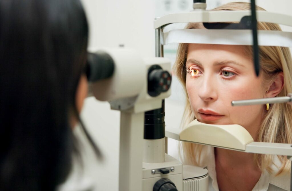 A patient getting an eye exam from an optometrist